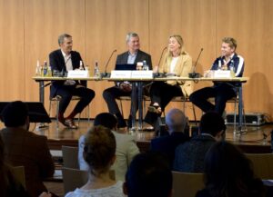 Panel on Rethinking Corporate Purposes with Markus Beckmann (Moderator, FAU), Dorothee Baumann-Pauly (Unisversity of Geneva), Mark Wielga (NomoGaia), Stefan Seidel (Puma)