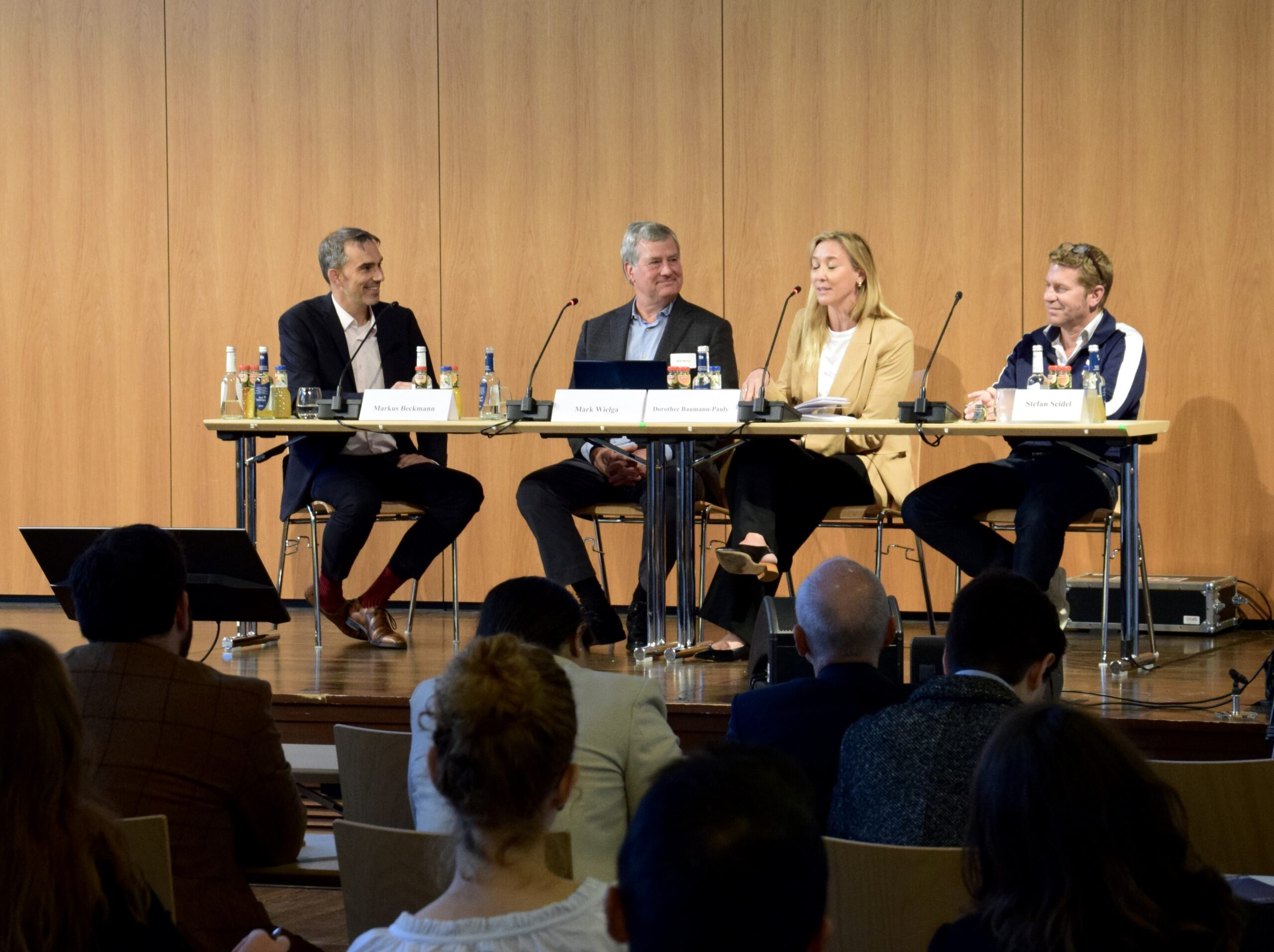 Panel on Rethinking Corporate Purposes with Markus Beckmann (Moderator, FAU), Dorothee Baumann-Pauly (Unisversity of Geneva), Mark Wielga (NomoGaia), Stefan Seidel (Puma)